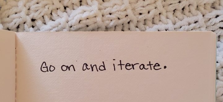 journal with writing, "Go on and iterate"